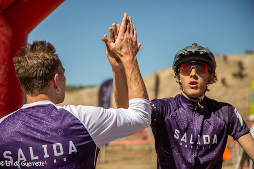 Salida teammates high five in Eagle, Colorado