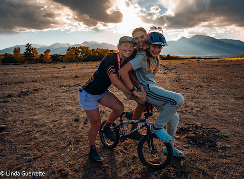 Three riders pile on a BMX bike in Nathrop, CO