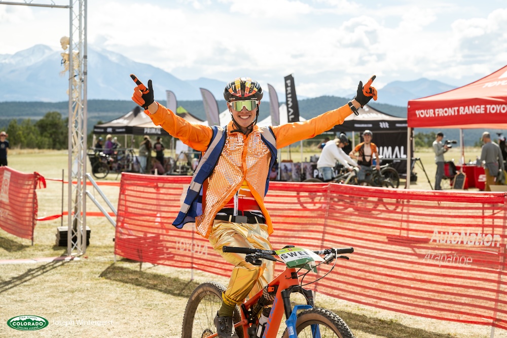 COLeague Glenwood State Champs Sweep Volunteer Rides No Handed Wearing Disco Clothes